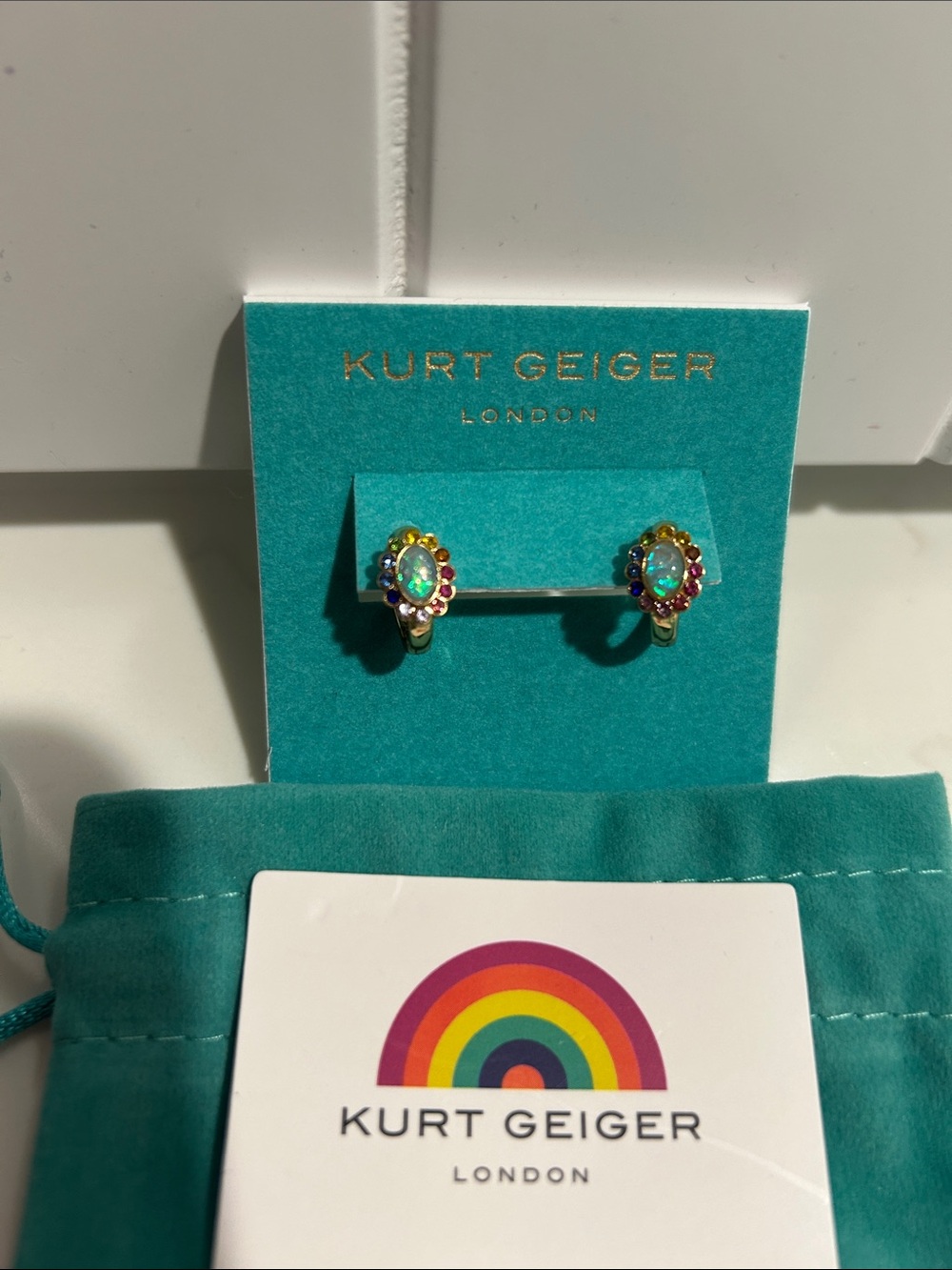 Kurt Geiger mini Huggie hoop earrings, Center opal-like cabochon NWT